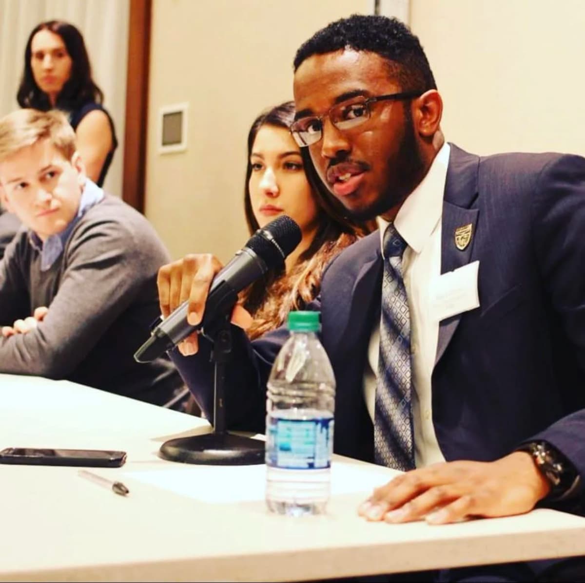 Jean Leconte II speaking at a panel