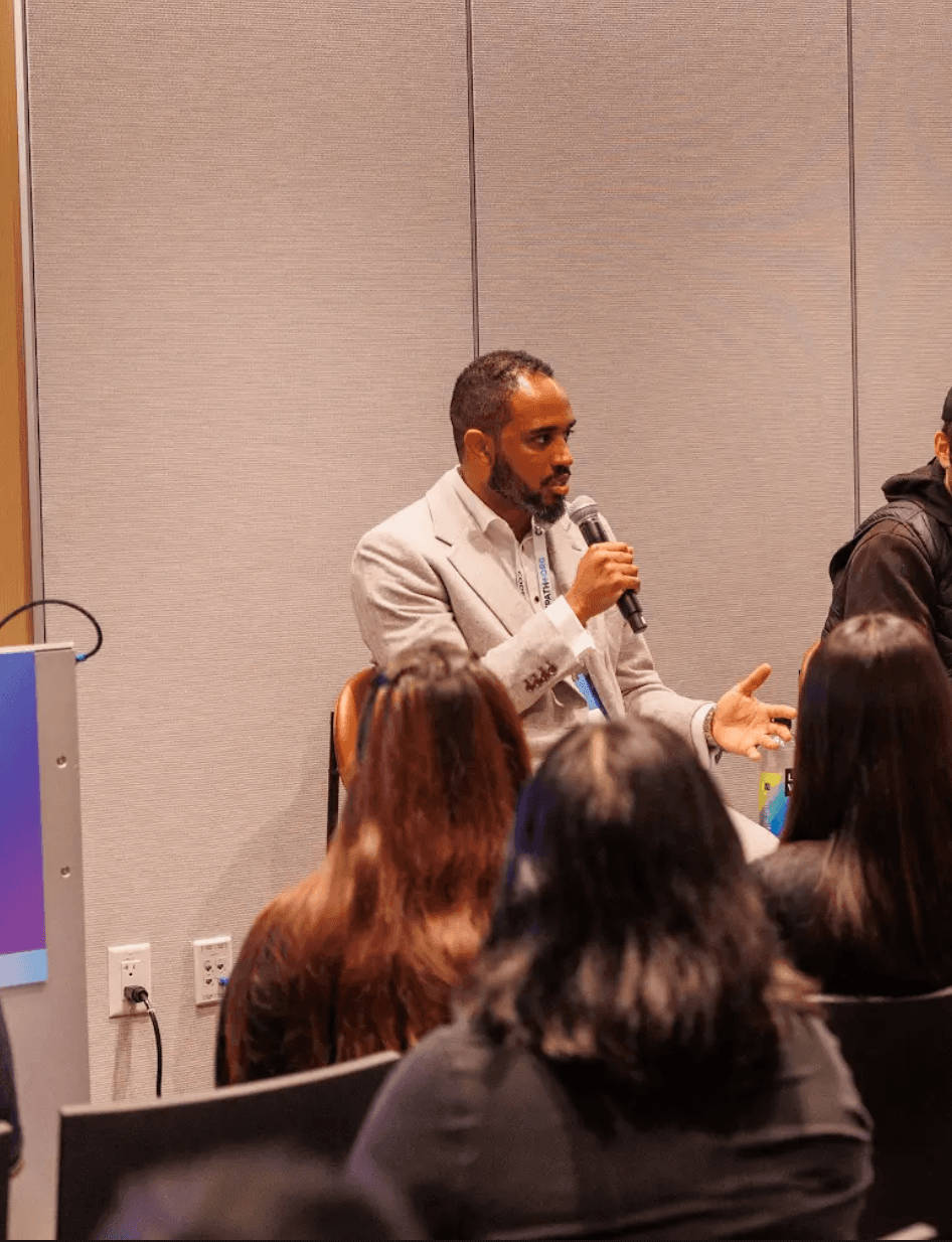 Jean speaking at an event